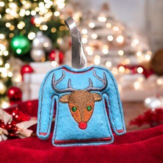 Pull Moche feutrine bleue broderie rouge